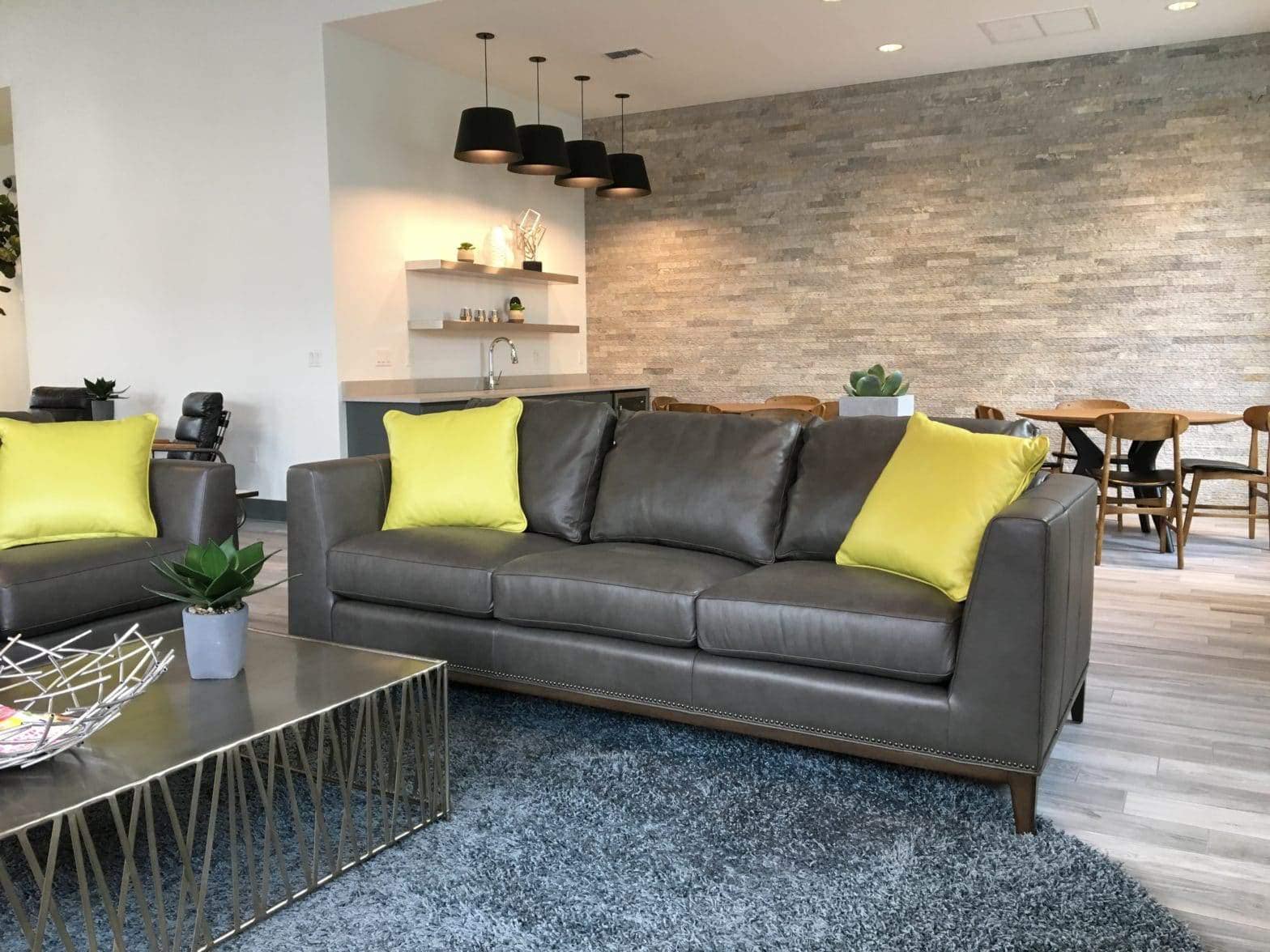 modern style sofa with chartreuse throw pillows