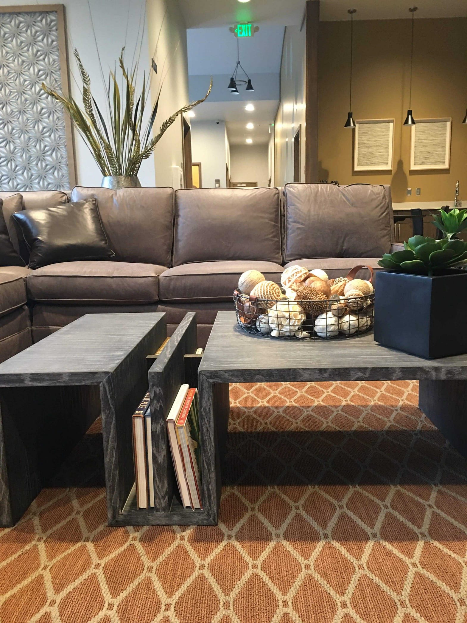 area rug in fall color season orange with gray coffee table